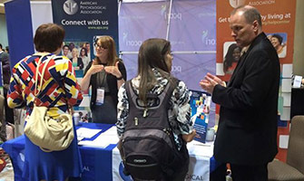 APA Practice Director of Research and Special Projects Vaile Wright, PhD (second from left) and Georgia Public Education Coordinator Kip Mathews, PhD (right) meet with health care journalists to promote the value of psychologists as mental and behavioral health care experts. 