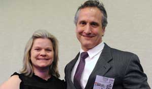 Hilary Kindsfater, PhD, from South Dakota receiving 2018 Federal Advocacy Coordinator of the Year award from Doug Walter, JD. Hilary Kindsfater, PhD, from South Dakota receiving 2018 Federal Advocacy Coordinator of the Year award from Doug Walter, JD.