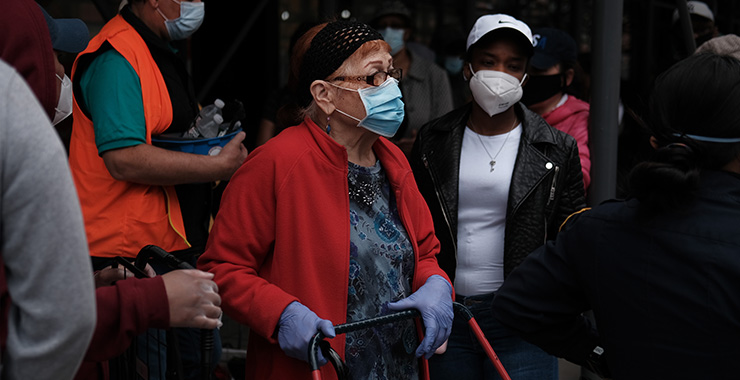 A group of people wearing face masks