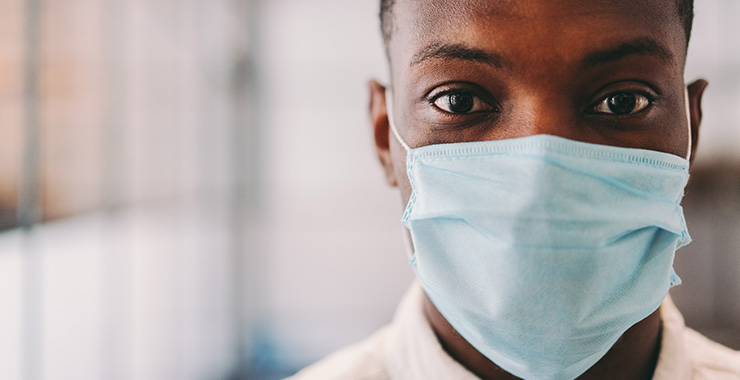 Masked lab technician