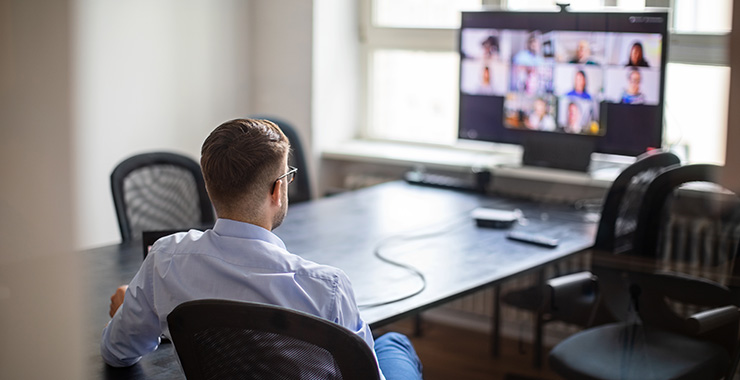 Man attending virtual meeting