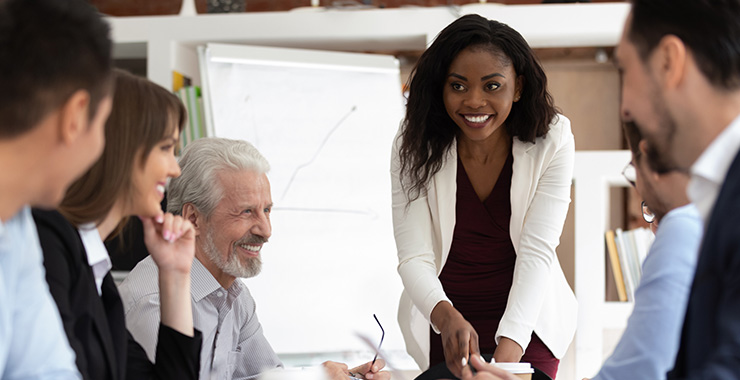Woman smiling in a meeting