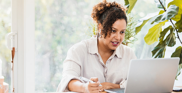Woman looking at her computer
