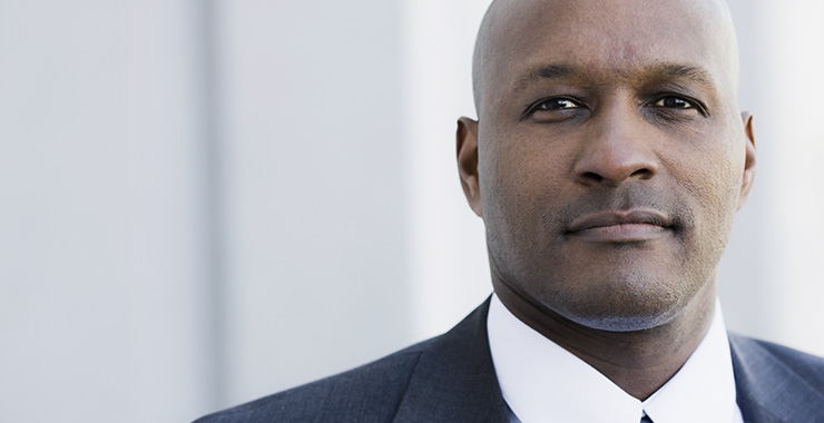 Close up of face of man in suit