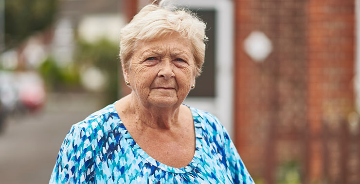 Close up image of elderly woman