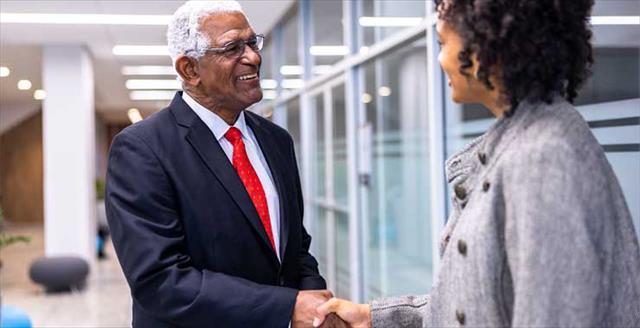 politician and constituent shaking hands
