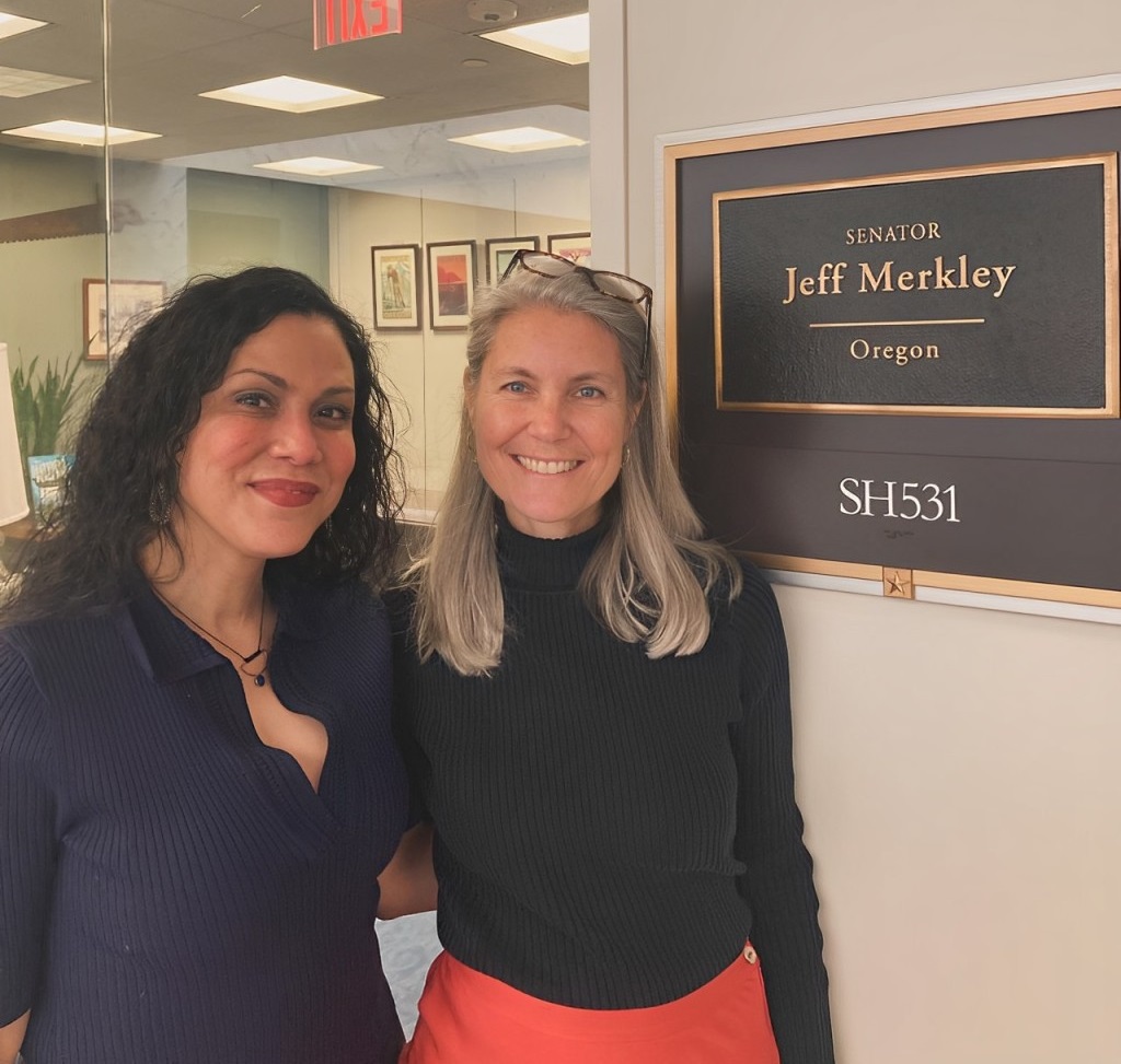 Eleanor Gil-Kashiwabara, PsyD, and Michele Ribeiro, EdD, pictured in front of Senator Jeff Merkley’s office