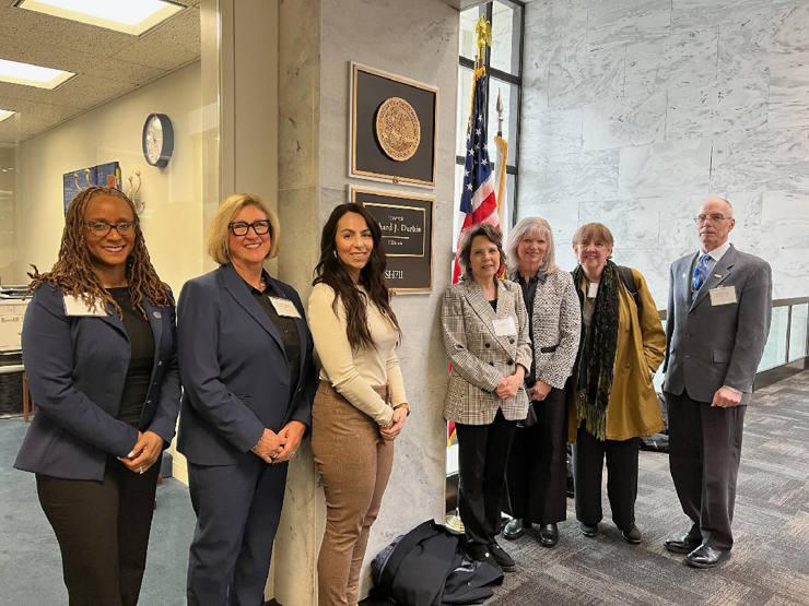 Left to right: Dr. Erin Alexander, Dr. Laura Faynor-Ciha, Dr. Jessica Punzo, Dr. Mary Louise Cashel, Dr. Catherine Haden, Dr. Theresa Schultz, and Dr. Joseph Comaty