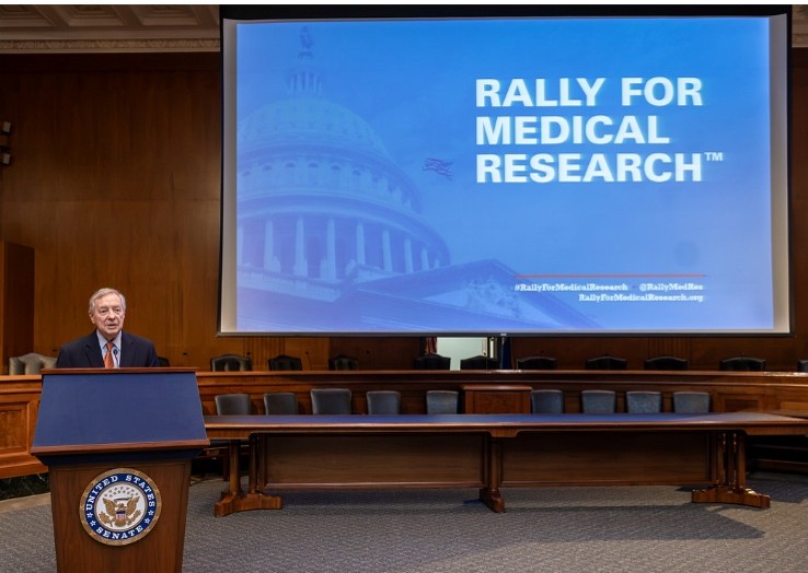 Senator Dick Durbin (D-Illinois) speaking on stage at the 2026 Rally for Medical Research Hill Day. Senator Dick Durbin (D-Illinois) speaking on stage at the 2026 Rally for Medical Research Hill Day.