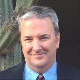 Headshot of Greg Shrader.