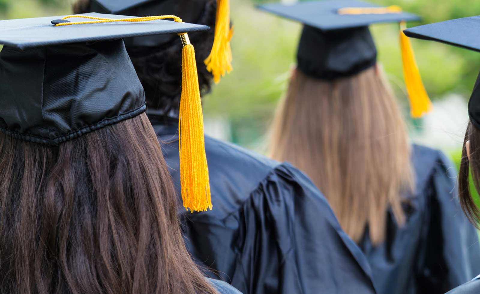Graduation class wearing caps and gowns 