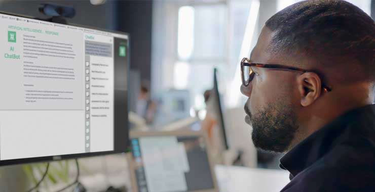 man looking at a computer screen