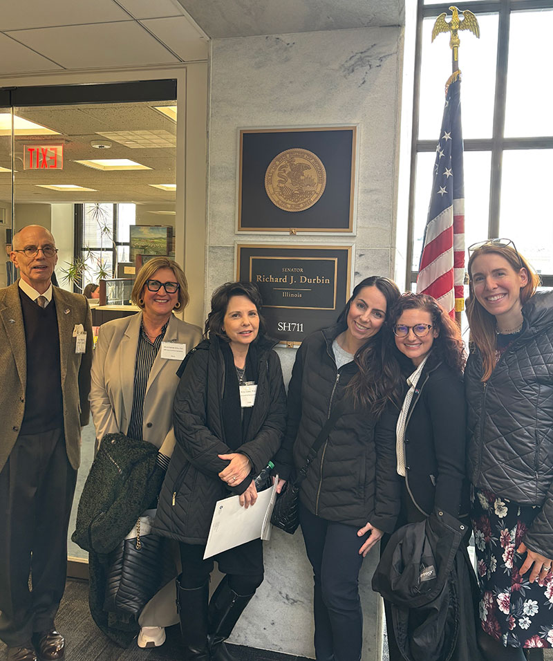 APA members from Illinois pose outside Sen. Dick Durbin’s office
