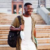 Student walking with his backpack