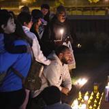 People at a candlelight vigil
