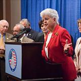 Rep. Grace F. Napolitano speaking at a podium.