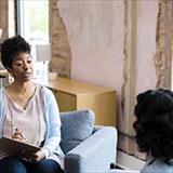 Psychologist meeting with female client