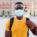 College student wearing a mask