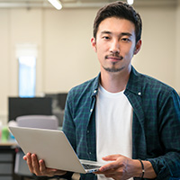 Man holding a laptop