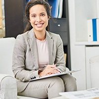 professional woman with paper and pencil