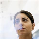 photo of a woman behind a glass