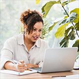 Woman looking at her computer