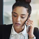 Young professional using a mobile phone.