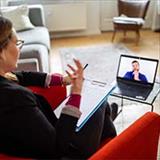 Woman conducting a telehealth session
