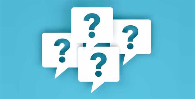 question marks on a teal background