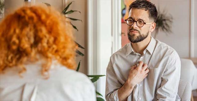 man in therapy session