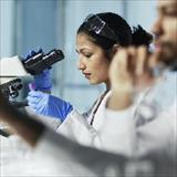 two lab technicians at work