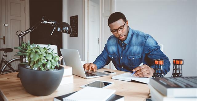 man working with a laptop