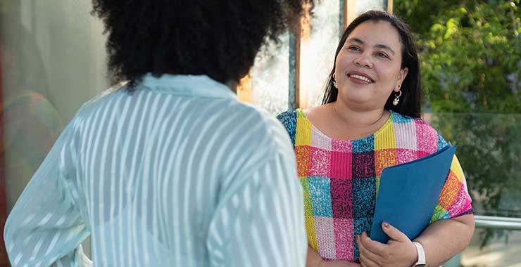 candidate for office talking to voter at home