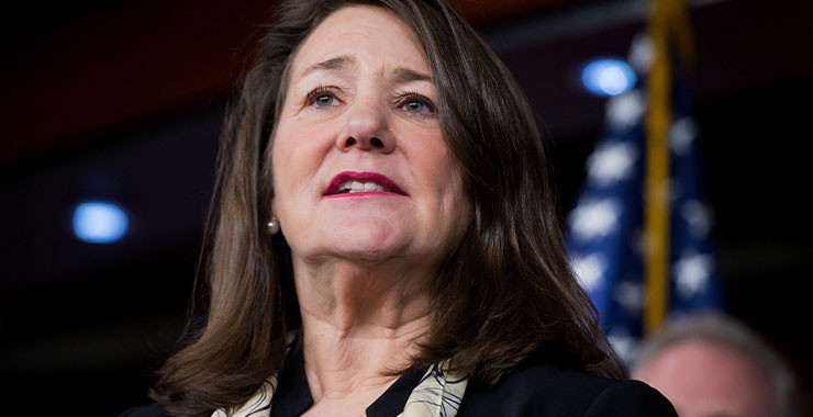 Reps. Diana DeGette (D-CO), in front of the American flag