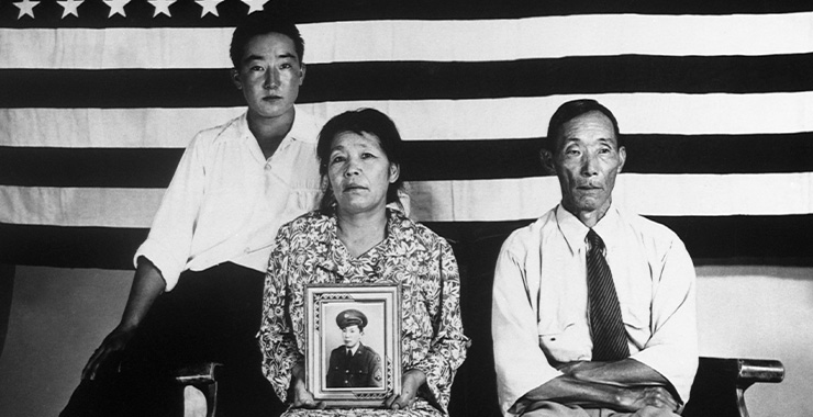 Black and white picture of Japanese American family