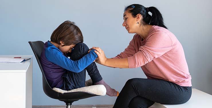 Therapist trying to get young boy to open up