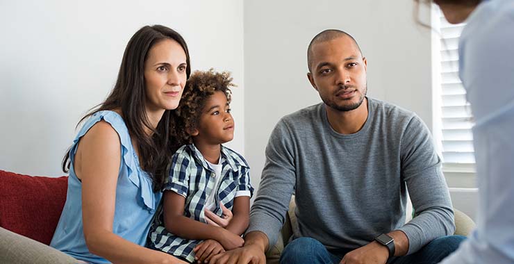 Family talking to health care professional