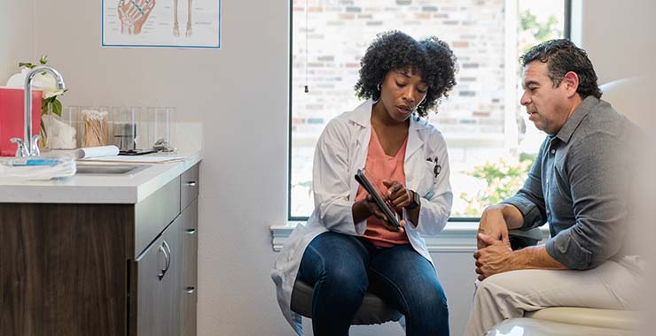 Doctor talking to patient