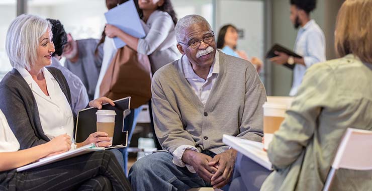 Older adults in a group meeting