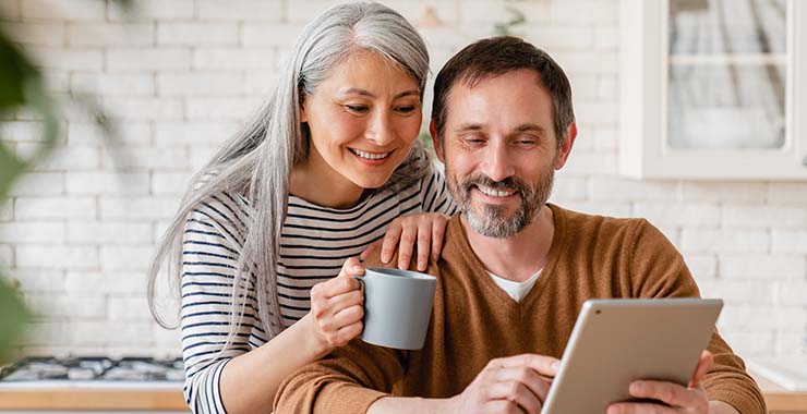 Couple looking at iPad