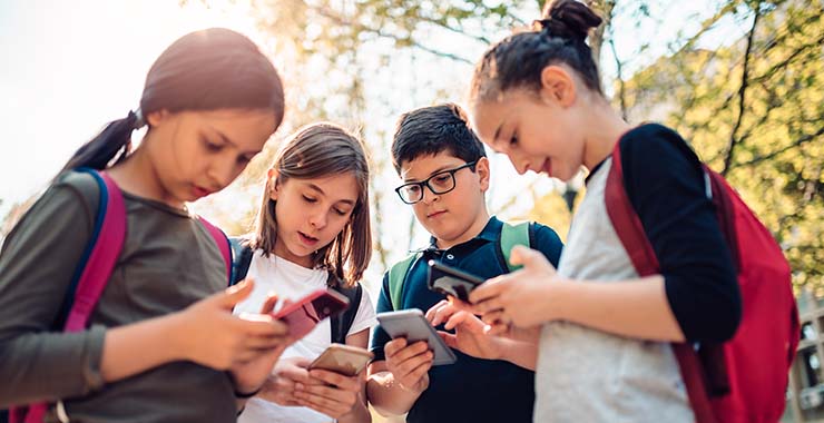 Kids on their smartphones