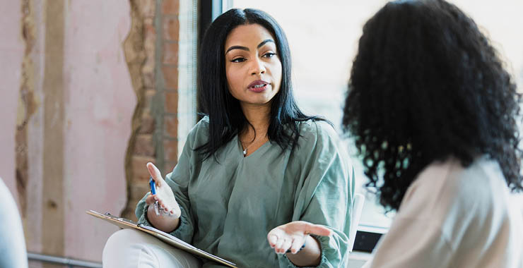 Two African American women in a meeting