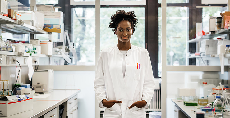 Young woman working in science lab