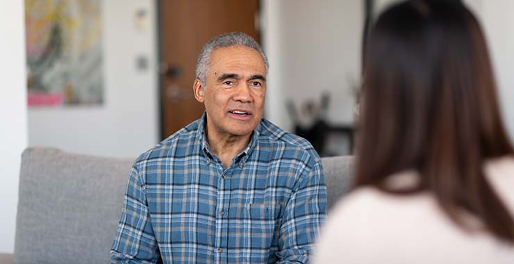 Man speaking with psychologist