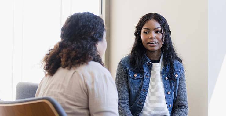 College student meeting with advisor