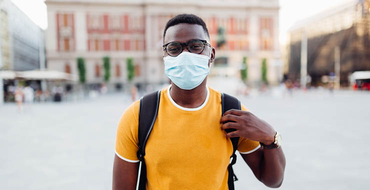 College student wearing a mask