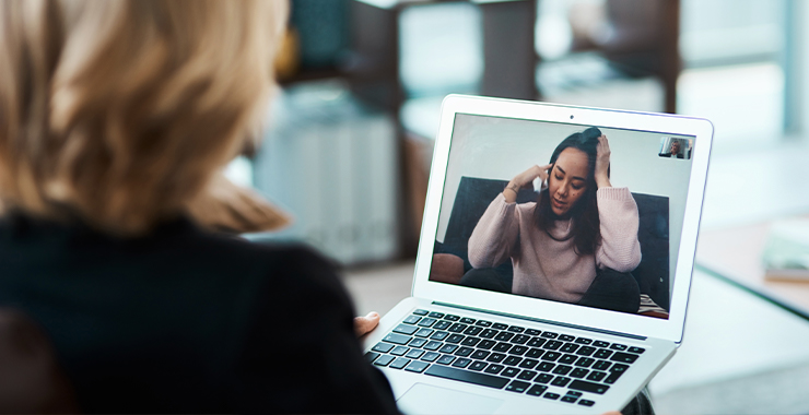Woman looking at computer screening