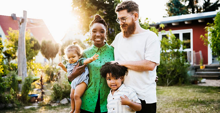 mixed race couple with young children