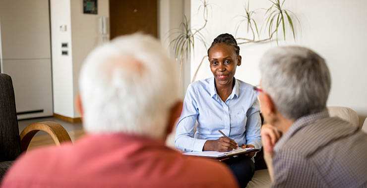 therapist in session with older couple
