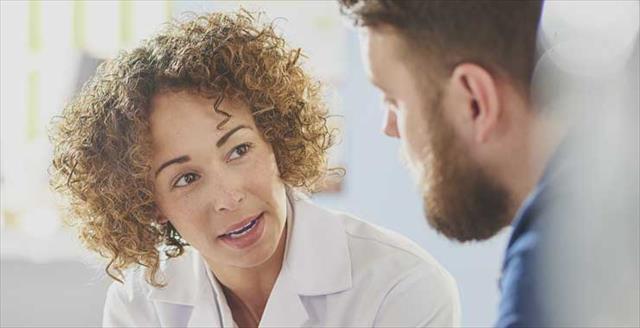 Practitioner speaking with patient 